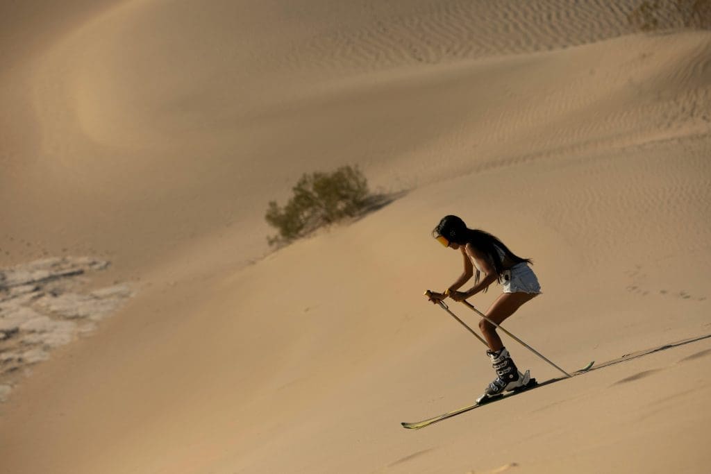 Skiing down a sand dune