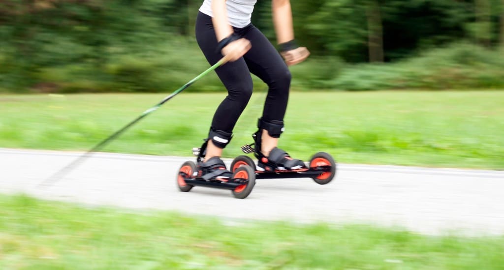 Woman Cross-country Skiing With Roller Ski