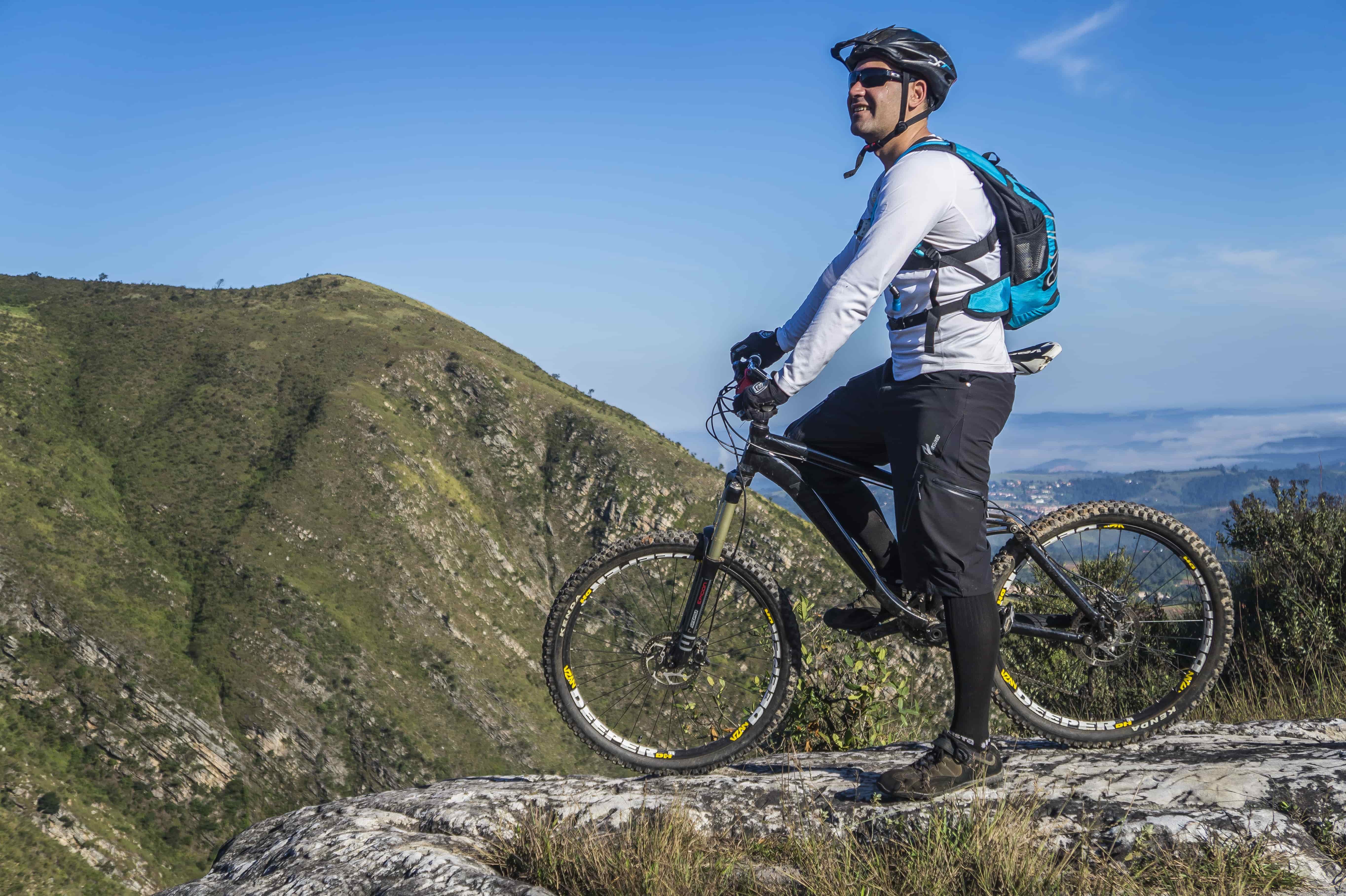 Man on a bike in the Alps