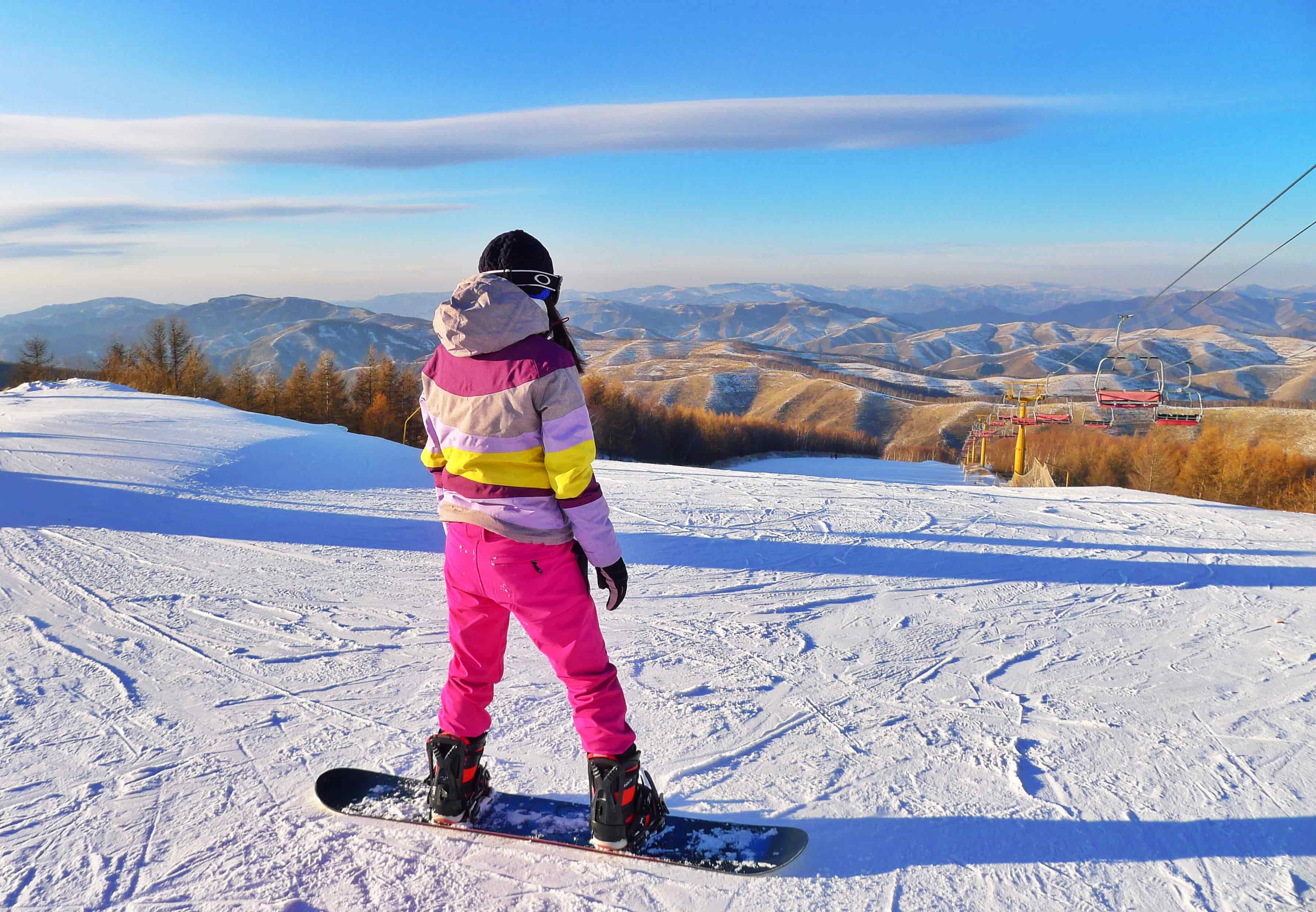 Snowboarder on top of the mountain