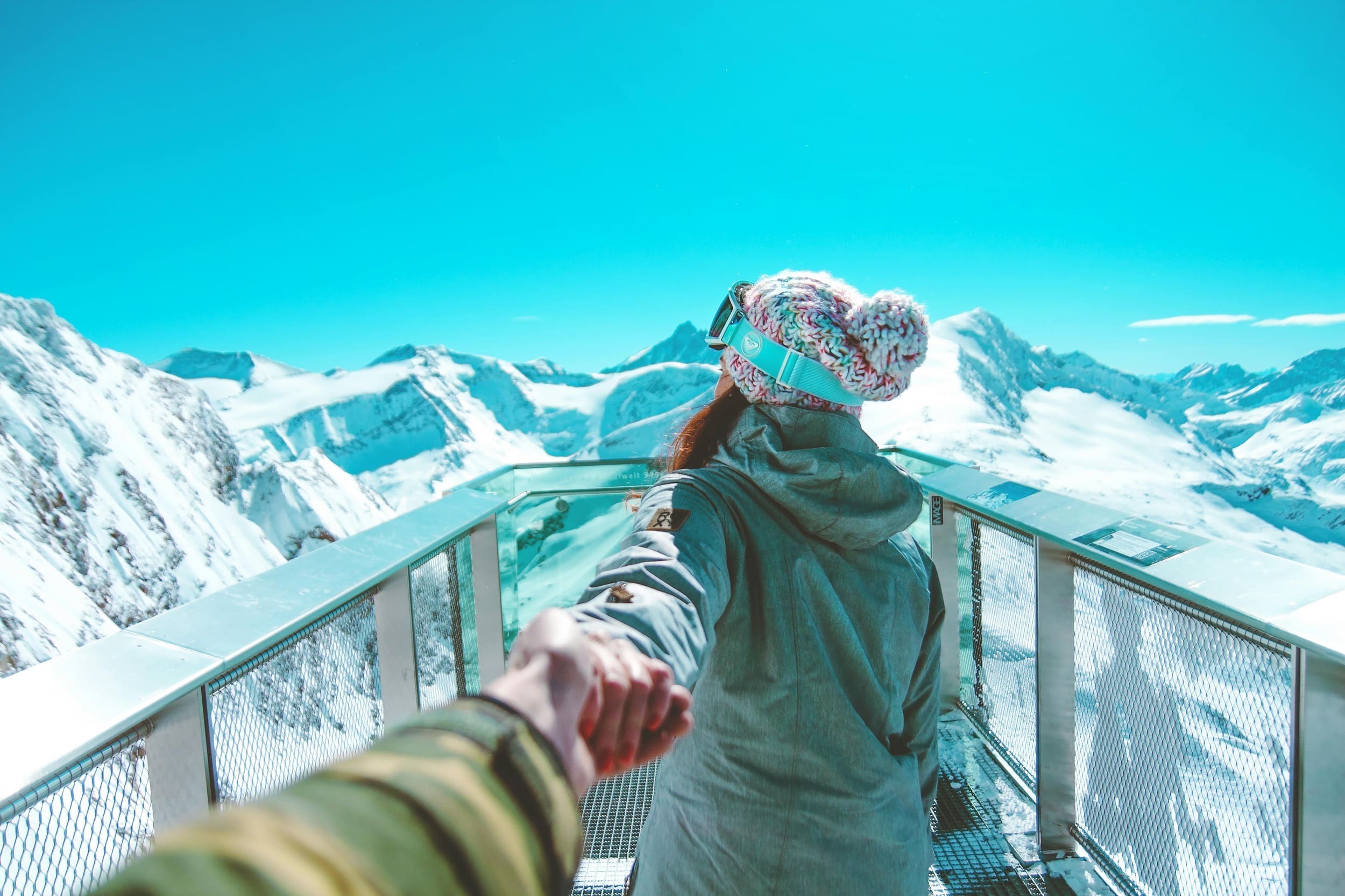 A couple admiring the Alpine moutains