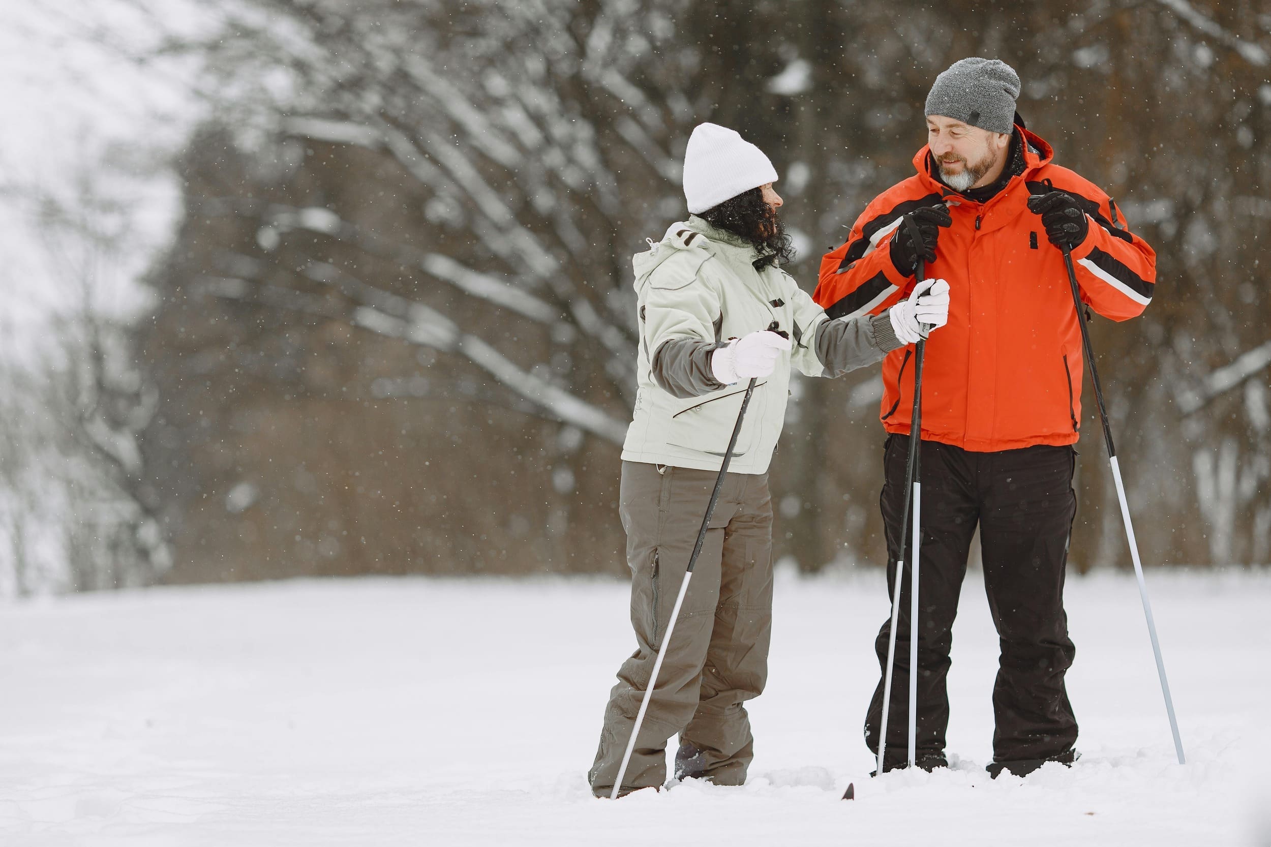 A couple skiing together